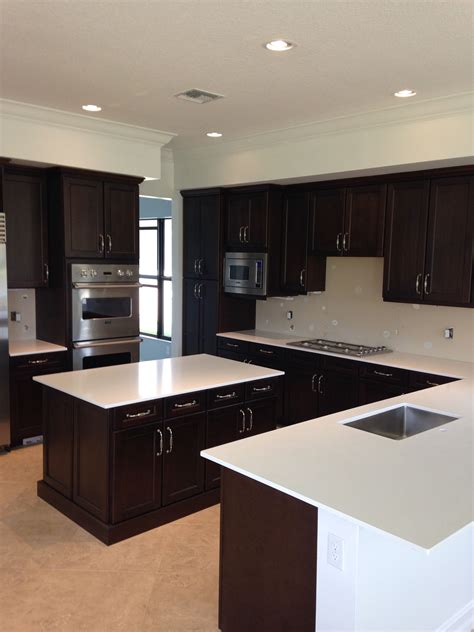 white cabinets dark brown countertops